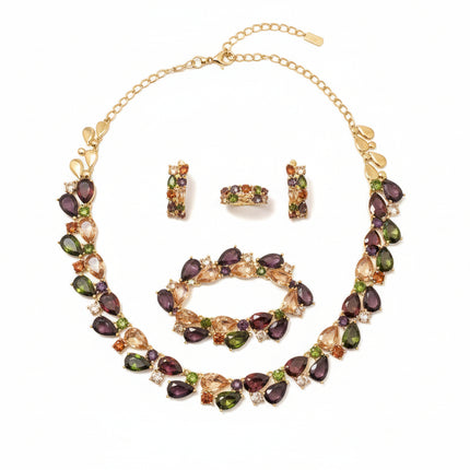 Jewelry set with gemstones on a green velvet stand