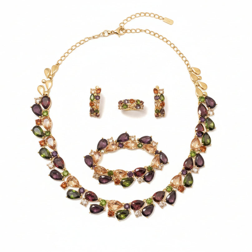 Jewelry set with gemstones on a green velvet stand